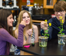 photo of high school students and Fast Plants